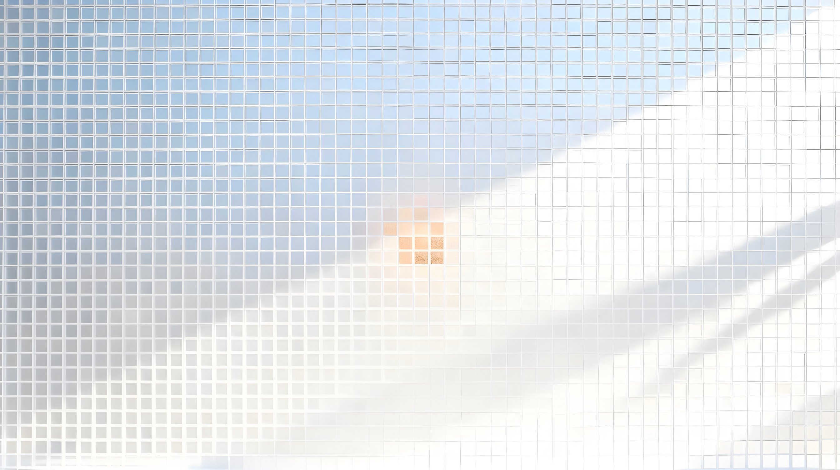 Illustration: a dark wall inset with a neat grid of small identical frosted glass panels, one of them glowing warm amber.